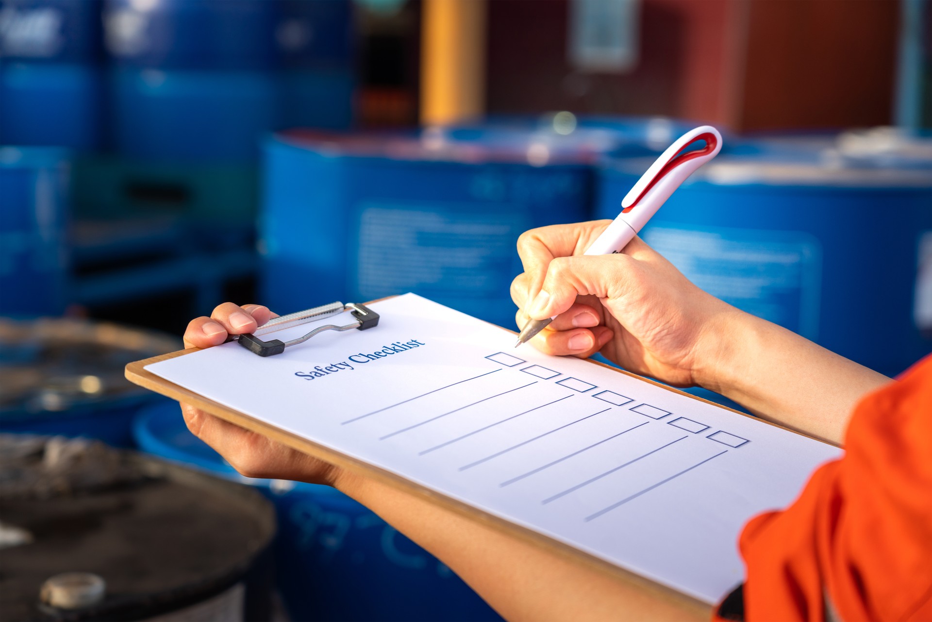 Safety inspection on the checklist document - Industrial safety concept photo.